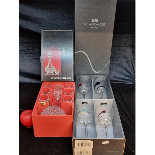 155 - Two boxes of glassware including a set of four Newgrange Living wine glasses as well as a Cristal D'... 