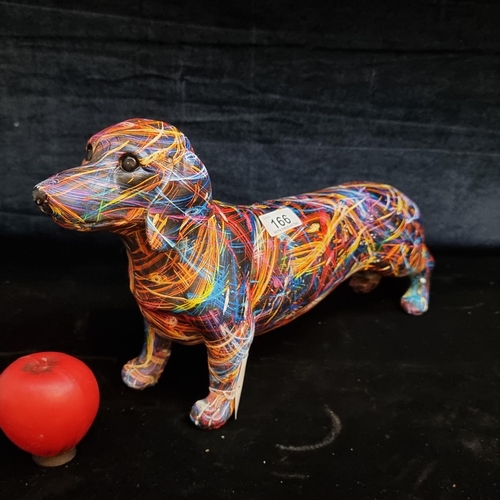 166 - A funky Interior design colourful figure in the form of a Dachshund dog. From a UK Home design compa... 