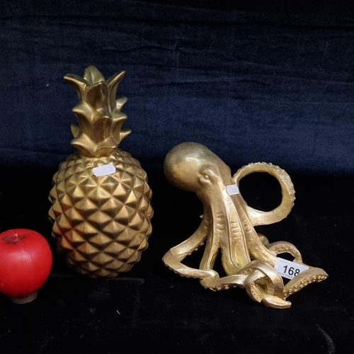 168 - Two Gold toned Home decor  items including a pineapple and a figure of an octopus. From a high end U... 