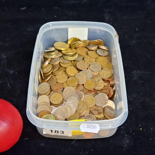 183 - A box containing a mixed assortment of vintage Irish coins.