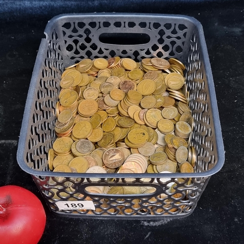 189 - A basket containing a mixed assortment of vintage Irish coins,