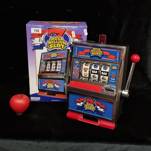 198 - A fun Mega Million table top slot machine, complete in original box.