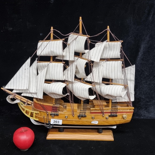 203 - A wonderful wooden scale model of a multi sail tall ship.