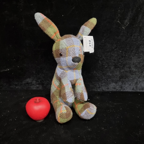 210 - A charming very heavy wool tartan rabbit doorstop.