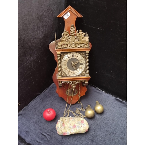 303 - A Franz Hermle & Sons, Germany wall clock with attractive brass barley twist design.