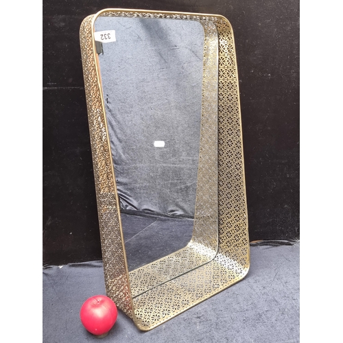 332 - A brand new pierced brass framed wall mirror featuring an intricate filigree design. It is of a rect... 