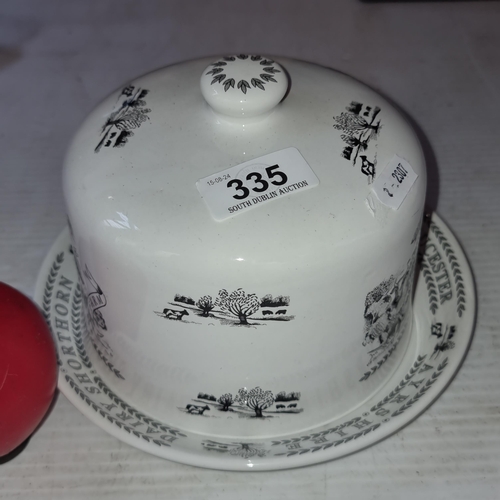 335 - A black and white ceramic cheese dome stamped Bridgewater Dairy Range to base.