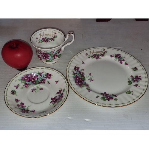 348 - A trio of 'Royal Albert Violets' cup, saucer and plate. Total. 3 Items.