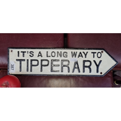 387 - A cast metal Tipperary finger pointer sign.