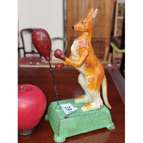 391 - A cast iron mechanical boxing kangaroo.