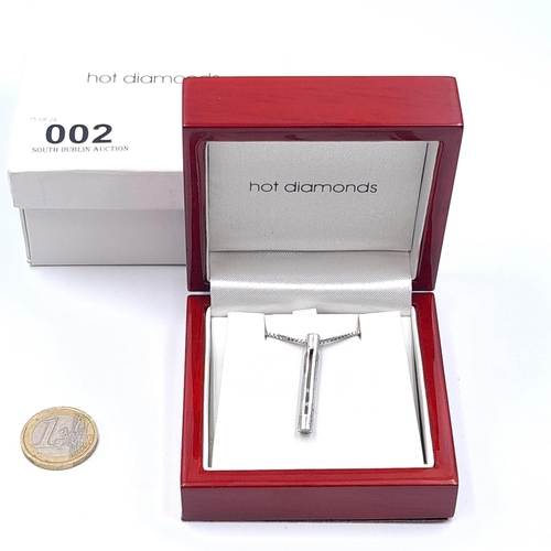 2 - A Hot Diamond pendant with silver chain. Length - 44 cms. Boxed.