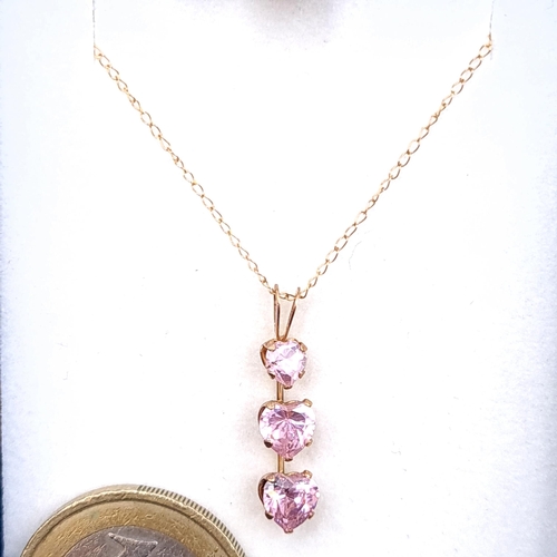 25 - A stunning 9ct gold graduated pink tourmaline heart shaped drop pendant gemstone necklace with chain... 