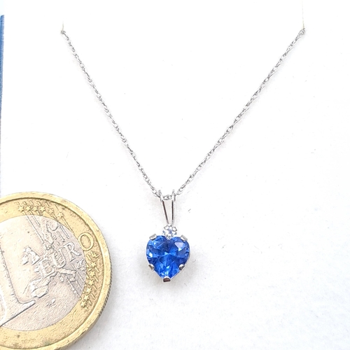 3 - A nice example of a heart shaped Tanzanite pendant set in sterling silver with sterling silver chain... 