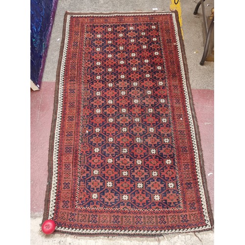 310 - Star Lot : A handmade Persian rug / Runner, All hand knotted would have taken a skilled rug maker ov... 