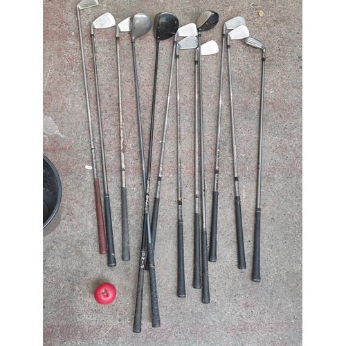 314 - A selection of twelve lynx Golf Clubs. Includes woods and irons. Also a ping wood.