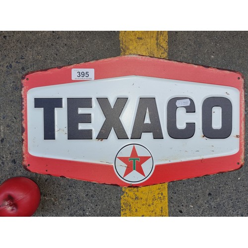 395 - A metal advertising sign for Texaco Motor Oil.