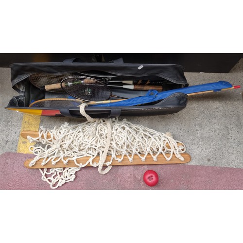 327 - A Snauwaert Tennis bag containing a rope Hammock , two fishing rods. Includes a 'RYOBI 30 Telepack' ... 