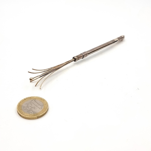 1051 - A fabulous Art Deco solid silver swizzle stick. Hallmarks very rubbed but can be seen indistinctly t... 