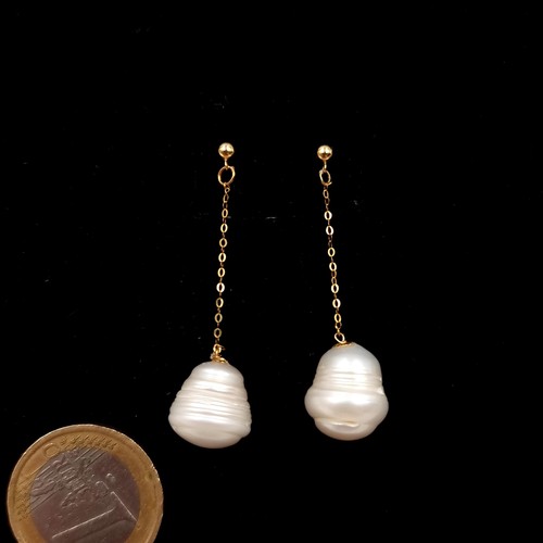 1054 - Star Lot : A pair of 18K yellow gold drop Ahoy pearl earrings. Suitable for pierced ears. Length of ... 