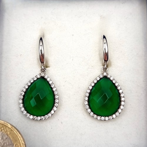 1073 - A sterling silver green tourmaline  pear drop earrings. Boxed. Weight 5.33 grams.