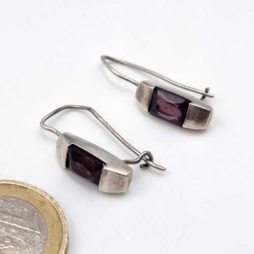 1086 - A pair of sterling silver gem set earrings. Stamped 925. Boxed. Weight 5.29 grams.