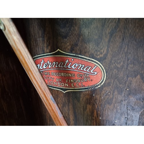 290 - Star Lot: A handsome oak cased wall clock with hand etched brass face. 'International Time Recording... 