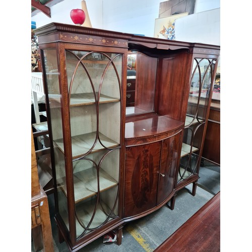 309 - Star Lot : A stunningly beautiful  Edwardian Mahogany display cabinet with curved glass doors, centr... 