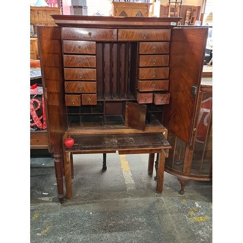 115 - Star Lot : A fabulous Victorian mahogany secretaire cabinet with very attractive wood grain and stri... 