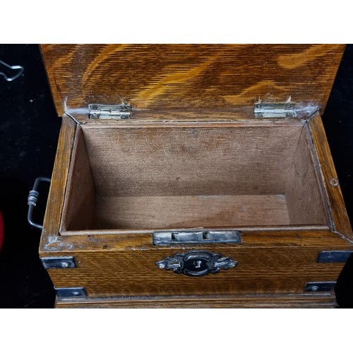 409 - A stunning early 20th century Oak Cigarette Box with white metal mounts and drop handles.