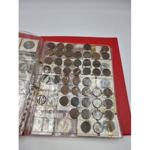 1066 - Star Lot : A World Coin Album. circa 220 coins including examples from Mexico, Saudi Arabia, and Ira... 