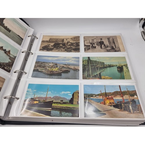 1067 - A large postcard album comprising of approx. 132 cards of Trawlers and Fishing Ports.