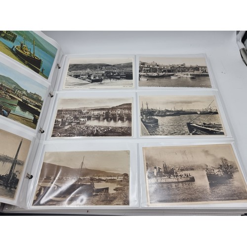 1067 - A large postcard album comprising of approx. 132 cards of Trawlers and Fishing Ports.