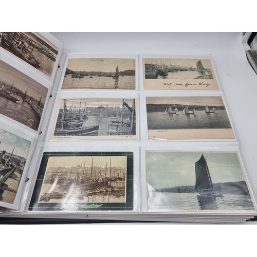 1067 - A large postcard album comprising of approx. 132 cards of Trawlers and Fishing Ports.