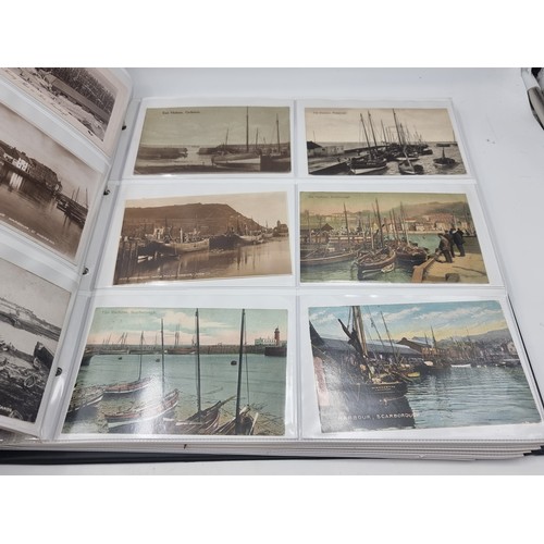 1067 - A large postcard album comprising of approx. 132 cards of Trawlers and Fishing Ports.