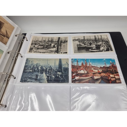 1067 - A large postcard album comprising of approx. 132 cards of Trawlers and Fishing Ports.