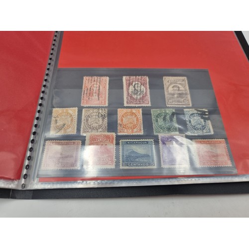 1071 - South America and Central America collection. An album of dealers display cards from early issues to... 