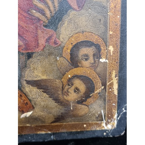 85 - Star Lot: An amazing 17th century Russian tempera on oak panel painting. Titled 'The Mother of God' ... 