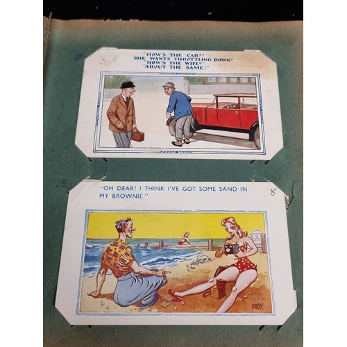 126 - A superb vintage/antique  comic postcard album. Approx. 90 cards.