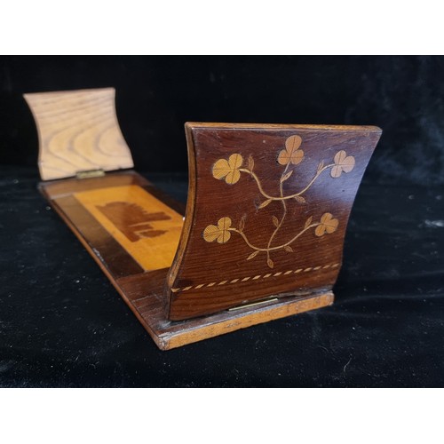 188 - A gorgeous rare antique Killarney ware mahogany book slide boasting beautiful string inlay and flora... 