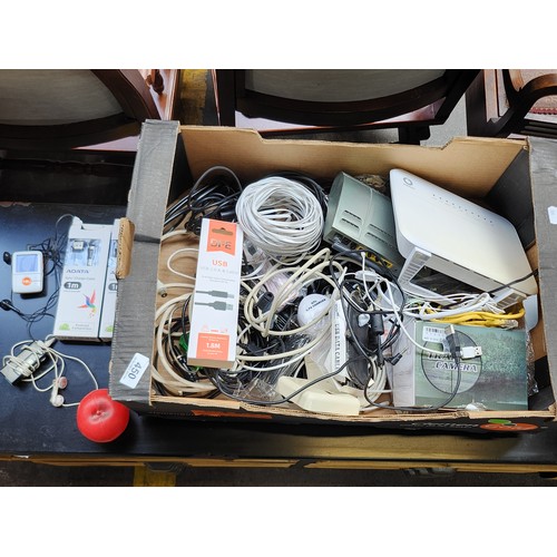 450 - A mixed lot including a, various data cables (ADATA, DFE), a trail camera, networking cables, and as... 