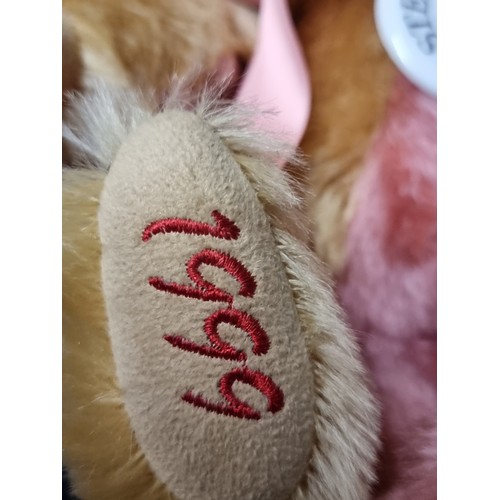 274 - A two toned Steiff club 1999 edition bear in excellent condition. With a button in the ear, original... 