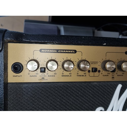 8 - Star Lot : A Marshall G100R CD Guitar Amplifier. It features normal and boost channels, master volum... 