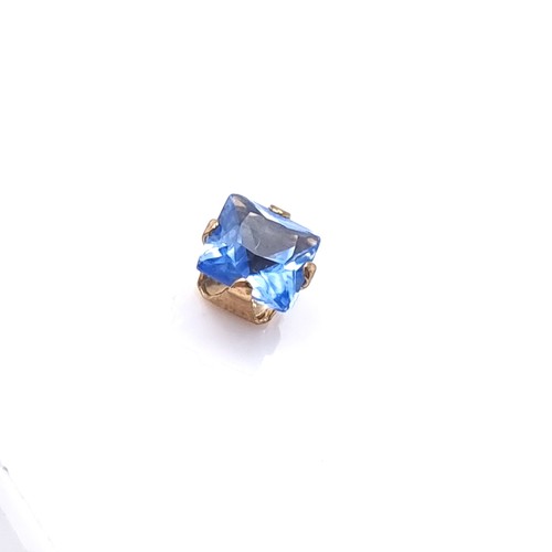 16 - A pair of blue Tanzanite nine carat gold stud earrings. Boxed.