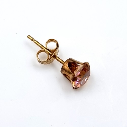 39 - A pair of stunning nine carat gold mystic topaz stud earrings. Boxed.