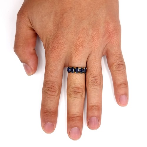 21 - Star Lot : A five stone sapphire ring marked 10 carat gold. Ring size - O. Weight - 1.68 grams. Boxe... 