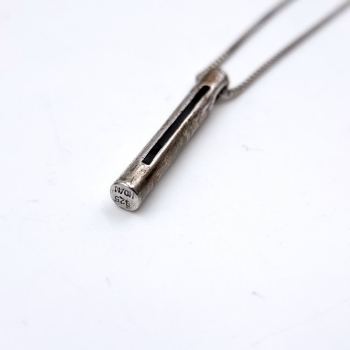 2 - A Hot Diamond pendant with silver chain. Length - 44 cms. Boxed.