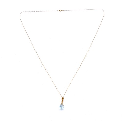 9 - An aquamarine drop pendant necklace set with 9ct gold chain. Boxed.