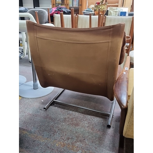 405 - Star Lot : Mid-Century Modern brown suede 1970s and chrome tubular cantilever chair with adjustable ... 