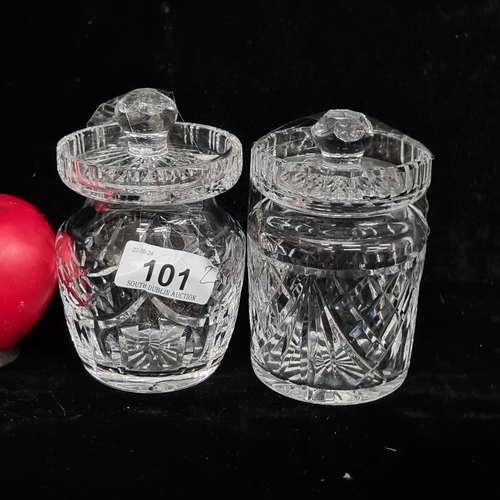 101 - Two wonderful Waterford Crystal lidded preserve jars. In good condition with acid marks to base.