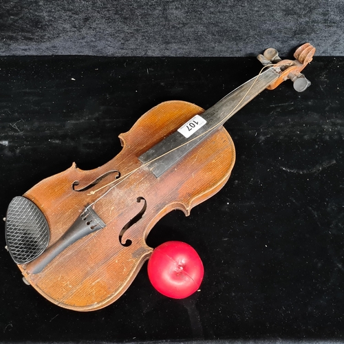 107 - Star Lot : A vintage wooden violin. Labelled Antonius Stradivarius, Cremona 1715 to interior.